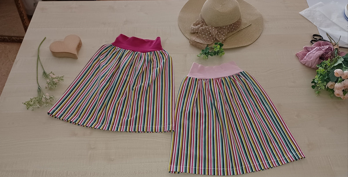 "Maiglöckchen" Kinderrock mit elastischem Bund gestreift rosa Gr. 110