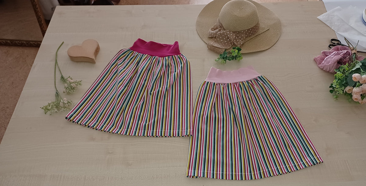 "Maiglöckchen" Kinderrock mit elastischem Bund gestreift pink Gr. 110